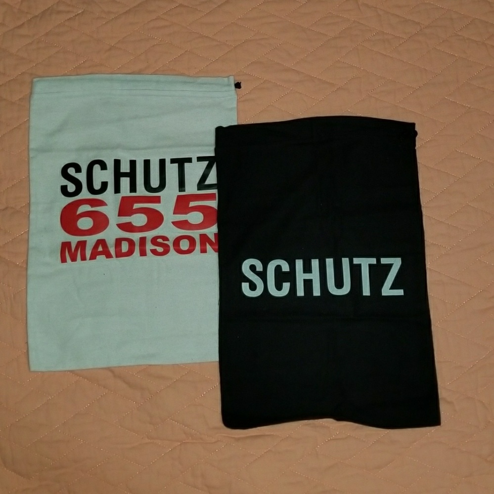 Two Schutz shoe dustbags